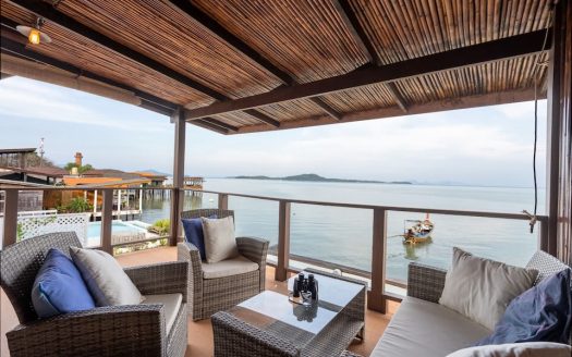 Turnkey Living: Exquisite Fully Furnished Over-the- Sea Villa